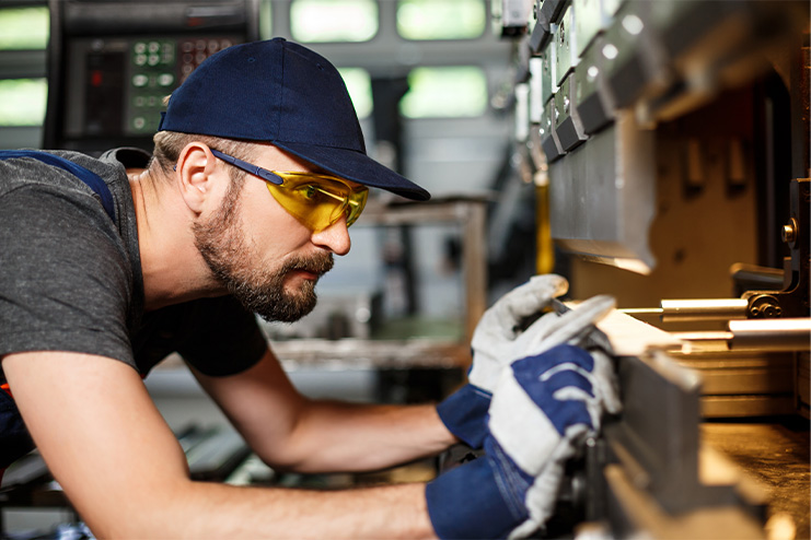 employee working on machine